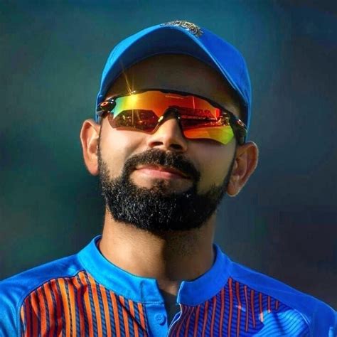 virat kohli wearing glasses.